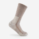 Thorlos women's beige crew hiking sock with moderate cushioning on clean background