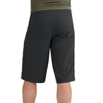 Dakine Vectra black shorts on male model against clean white background