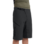 Dakine Vectra shorts in black with belt and side pockets on model