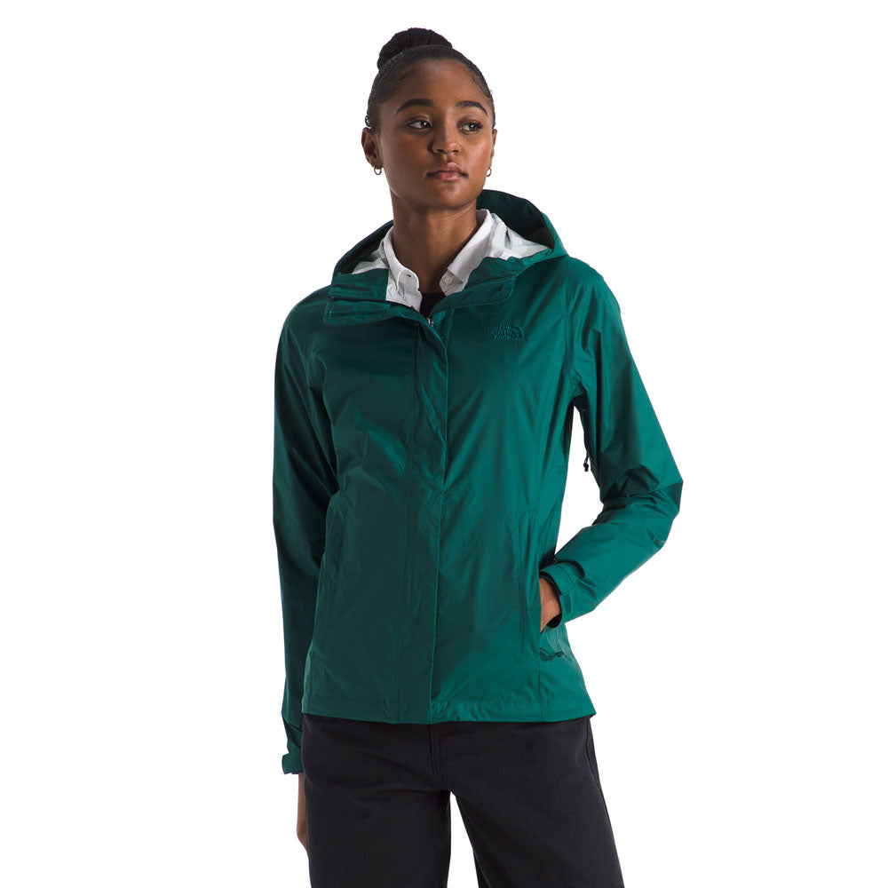 Woman wearing The North Face Venture 2 jacket in teal green with hood