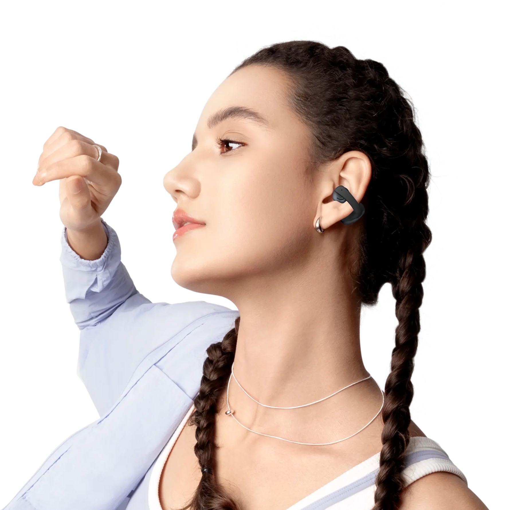 Woman wearing black Shokz OpenDots Air open-ear wireless earbuds with braided hair