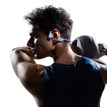 Athletic man wearing Shokz OpenRun Pro 2 bone conduction headphones during workout