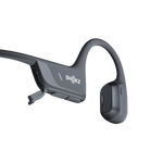 Shokz bone conduction headphones in gray with clean studio background