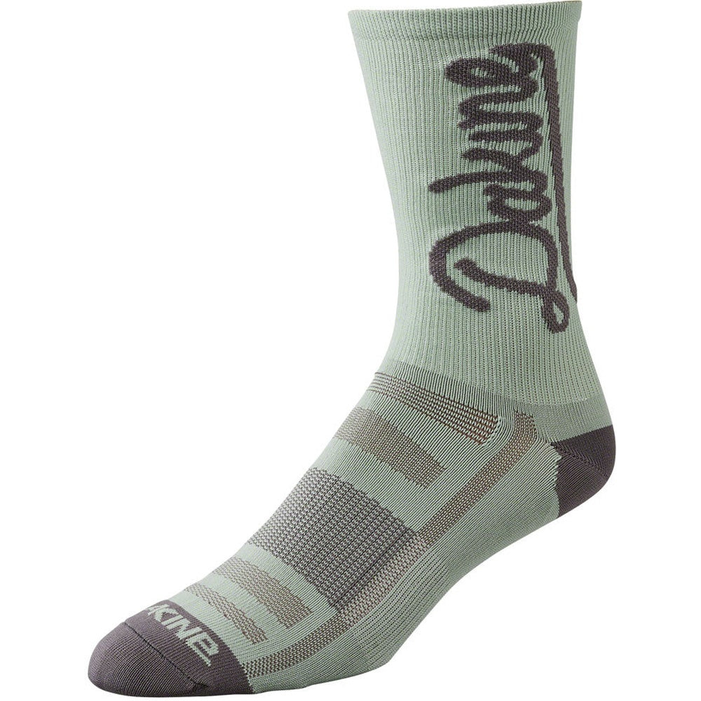 Dakine Singletrack Crew Sock in Desert Sage green with charcoal script logo and heel toe