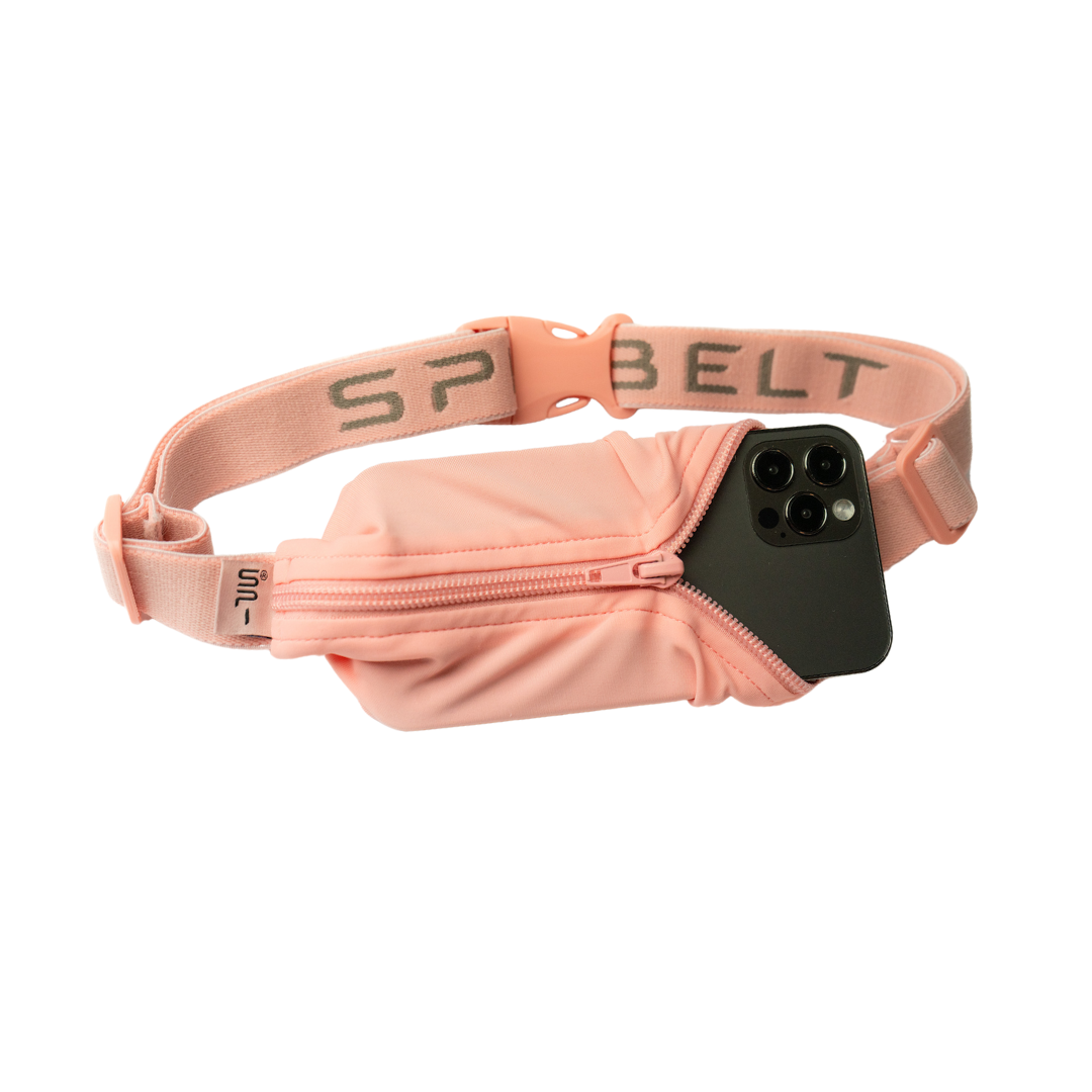 SPIbelt Monochromatic Pro Belt in rose gold with phone pocket open showing smartphone