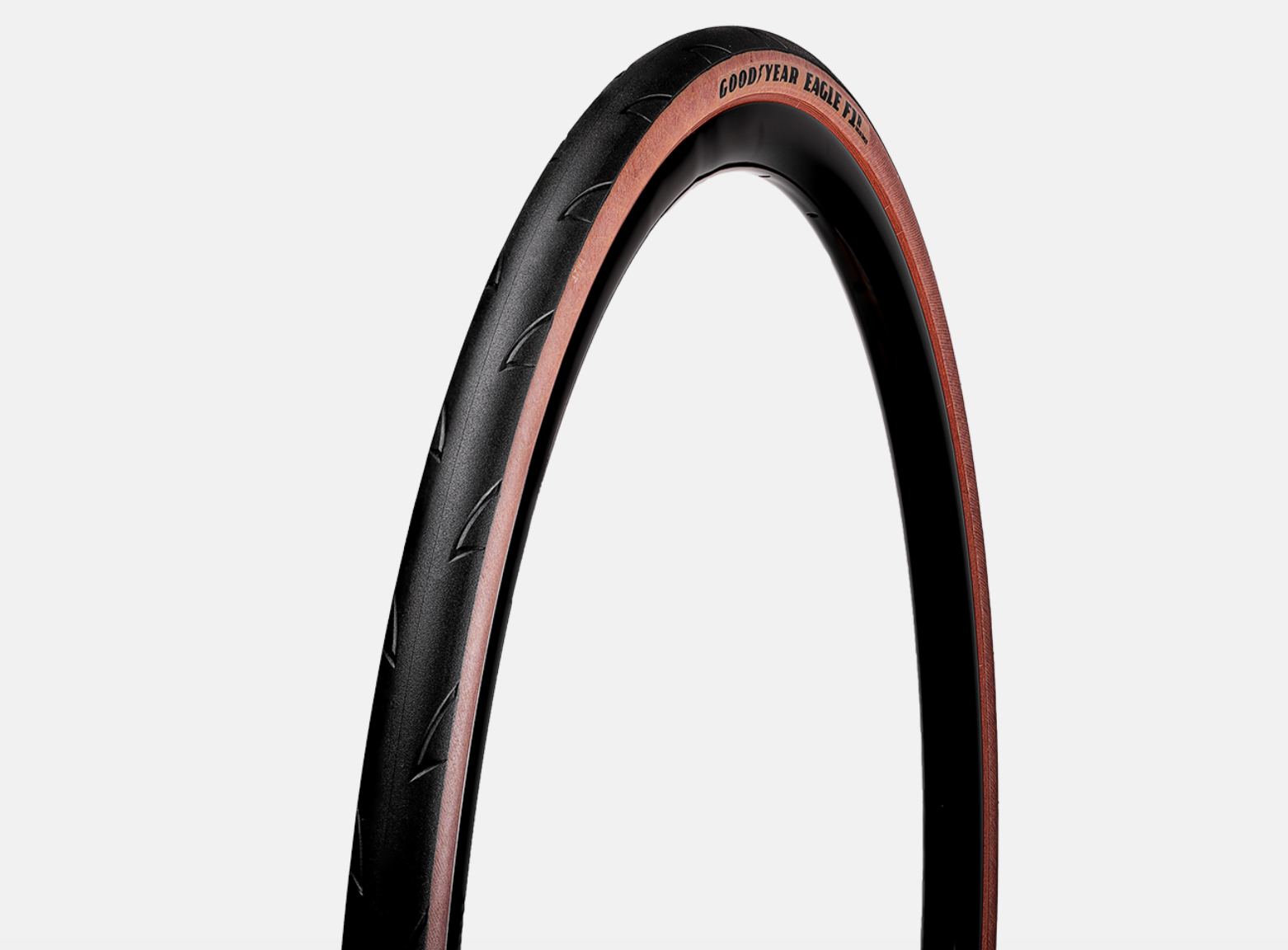 Goodyear Eagle F1 R bicycle tire with black tread and brown sidewall