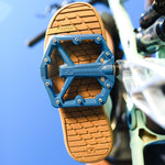 Blue Crank Brothers Stamp 1 Small bicycle pedal attached to bike crank