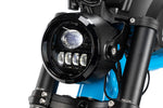 Close-up of Super73 R Brooklyn electric bike DOT-certified LED headlight on blue fork assembly