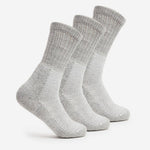 Three Thorlos light grey wool blend trekking crew socks with cushioned sole displayed upright