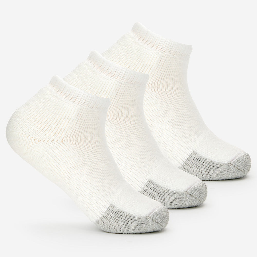 Thorlos white ankle socks with gray toe caps, three pack displayed together