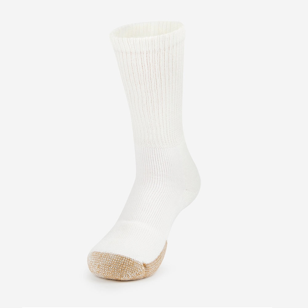 Thorlos white crew tennis sock with gold cushioned toe, displayed upright on neutral background