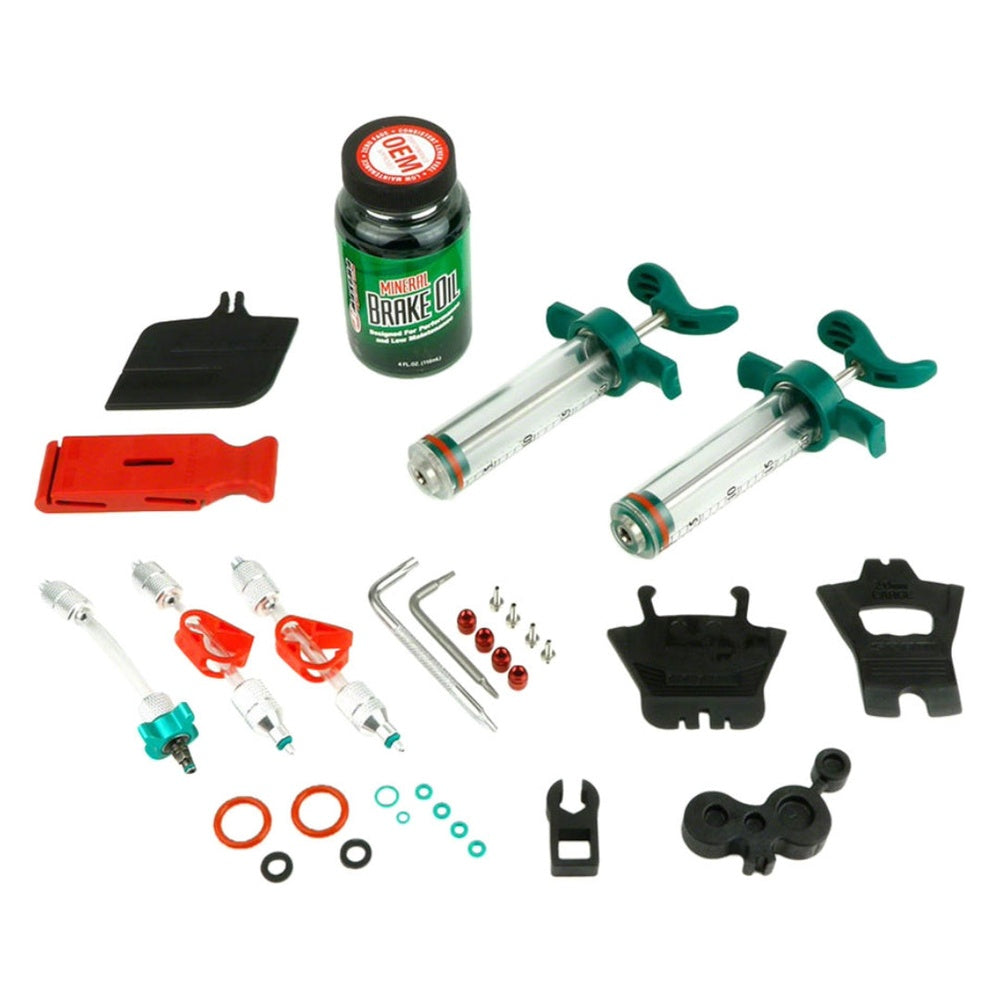 SRAM Pro bicycle brake bleeding kit with syringes, oil bottle, and tools on white background