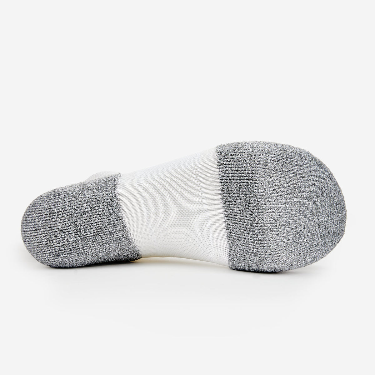 Bottom view of Thorlos Experia Energy sock showing gray heel and toe with white arch