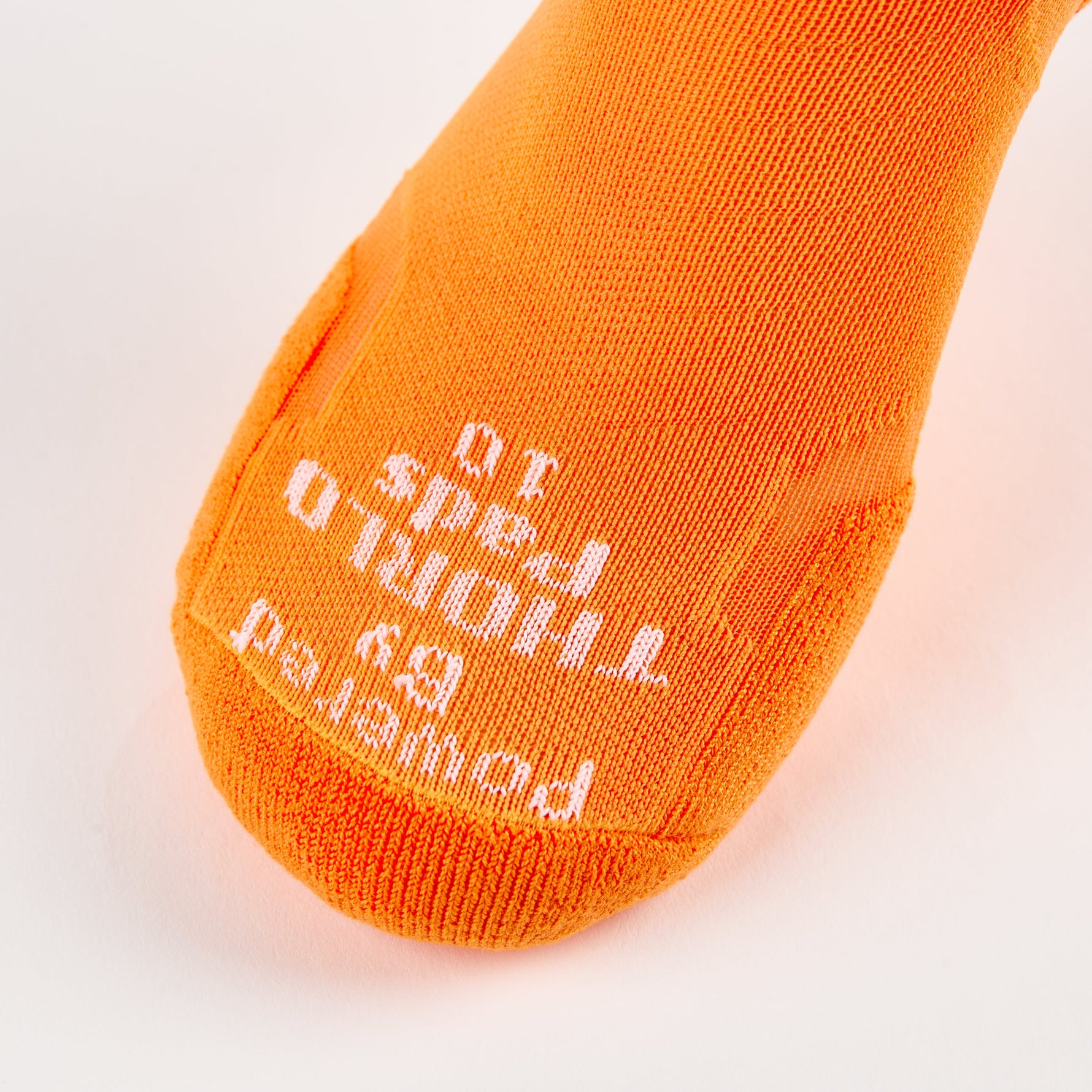 Experia Light Cushion Low-Cut Sock in tangerine orange with white toe box text