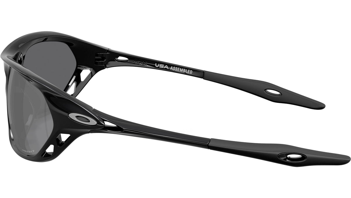 Oakley Cage Jacket sunglasses side view showing temple arms with USA Assembled text and Oakley logo