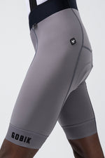 GOBIK Absolute Compact 7.0 bib shorts in gray with professional studio lighting