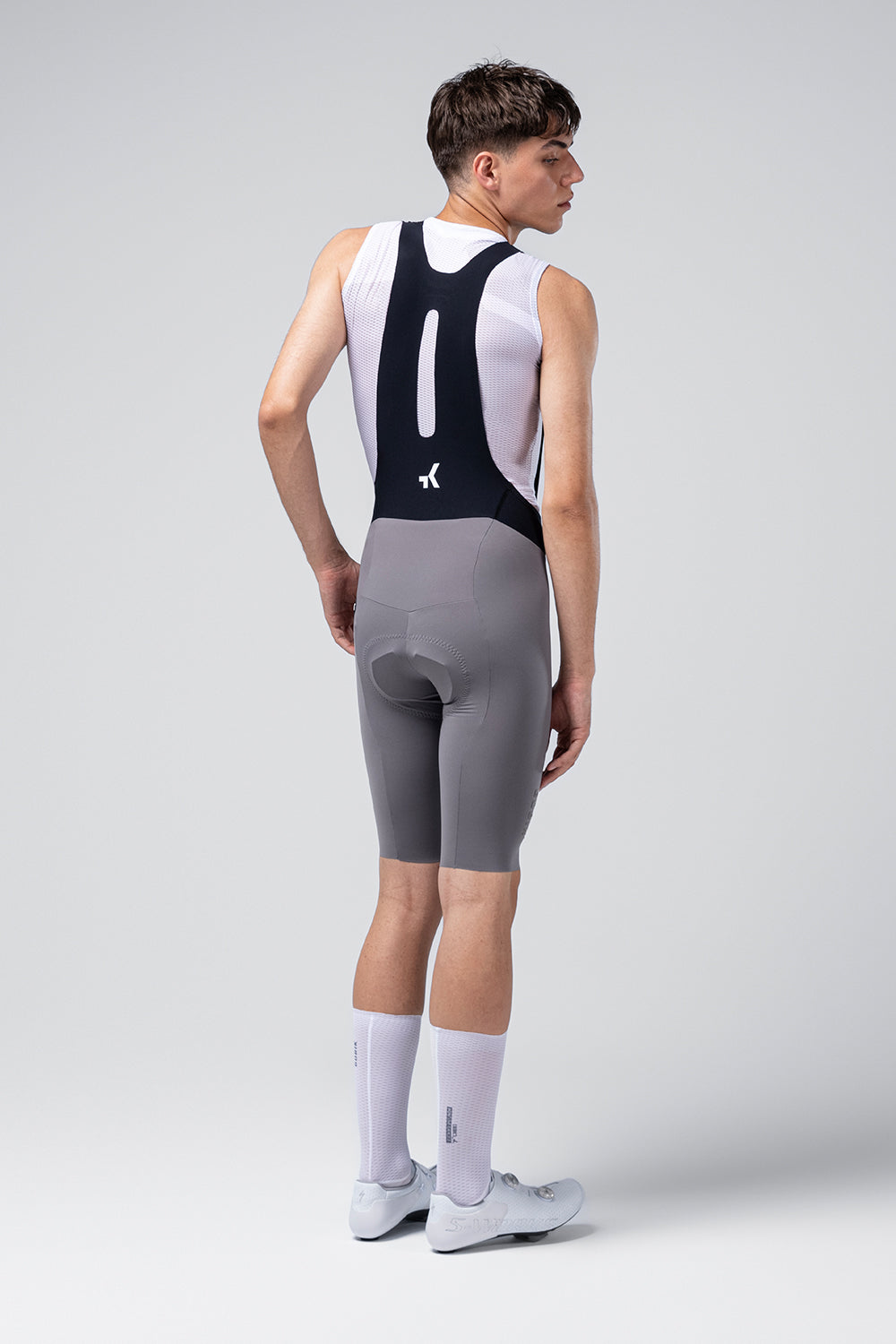 Gobik X Bib Short Men's in kettle gray color, rear view showing cycling shorts