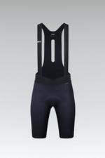 Gobik X Bib Short Men's in navy blue with black straps on gray background
