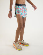ChicknLegs men's split running shorts with flying pig print pattern