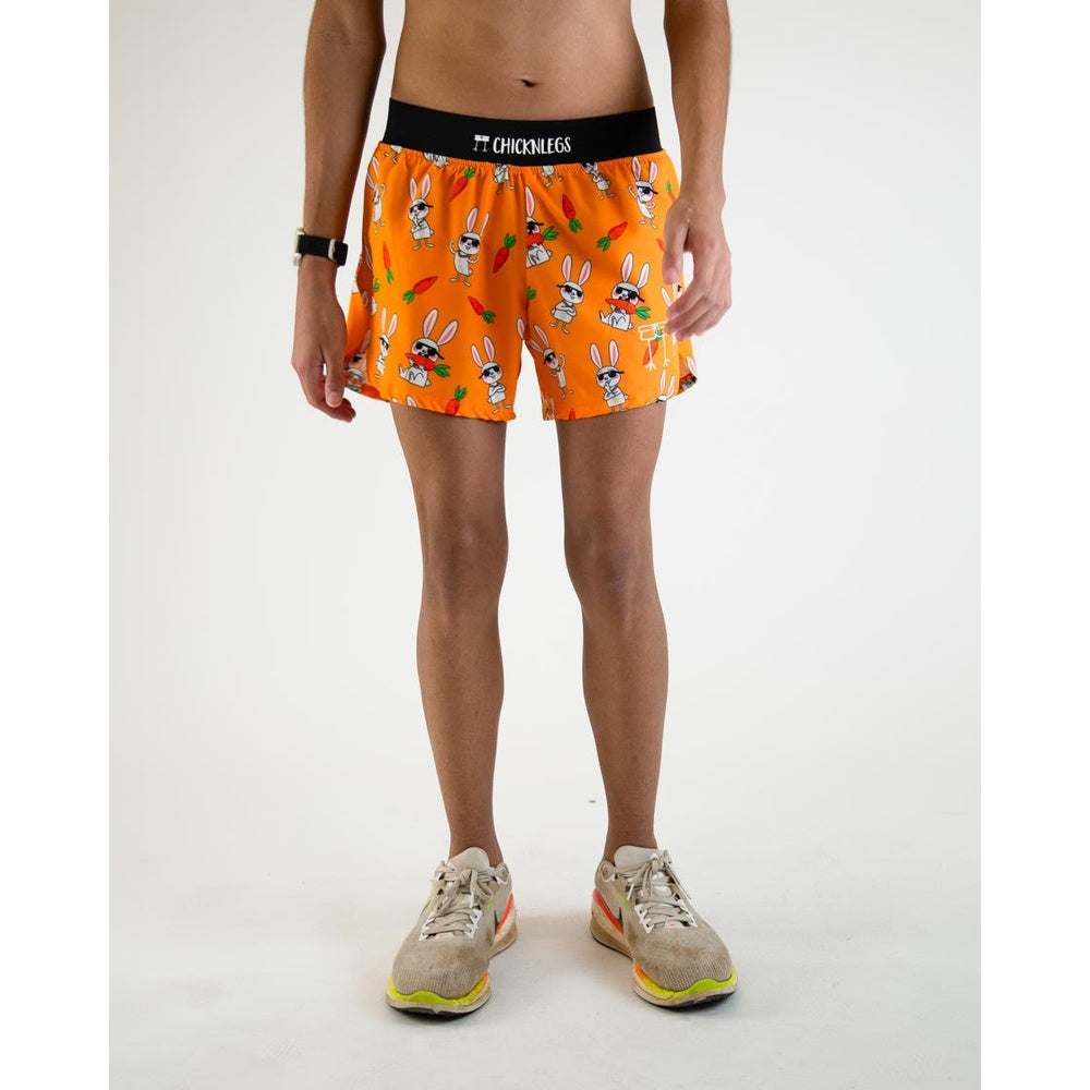 ChicknLegs 4-inch Half Split running shorts in orange Bad Bunny pattern on male model