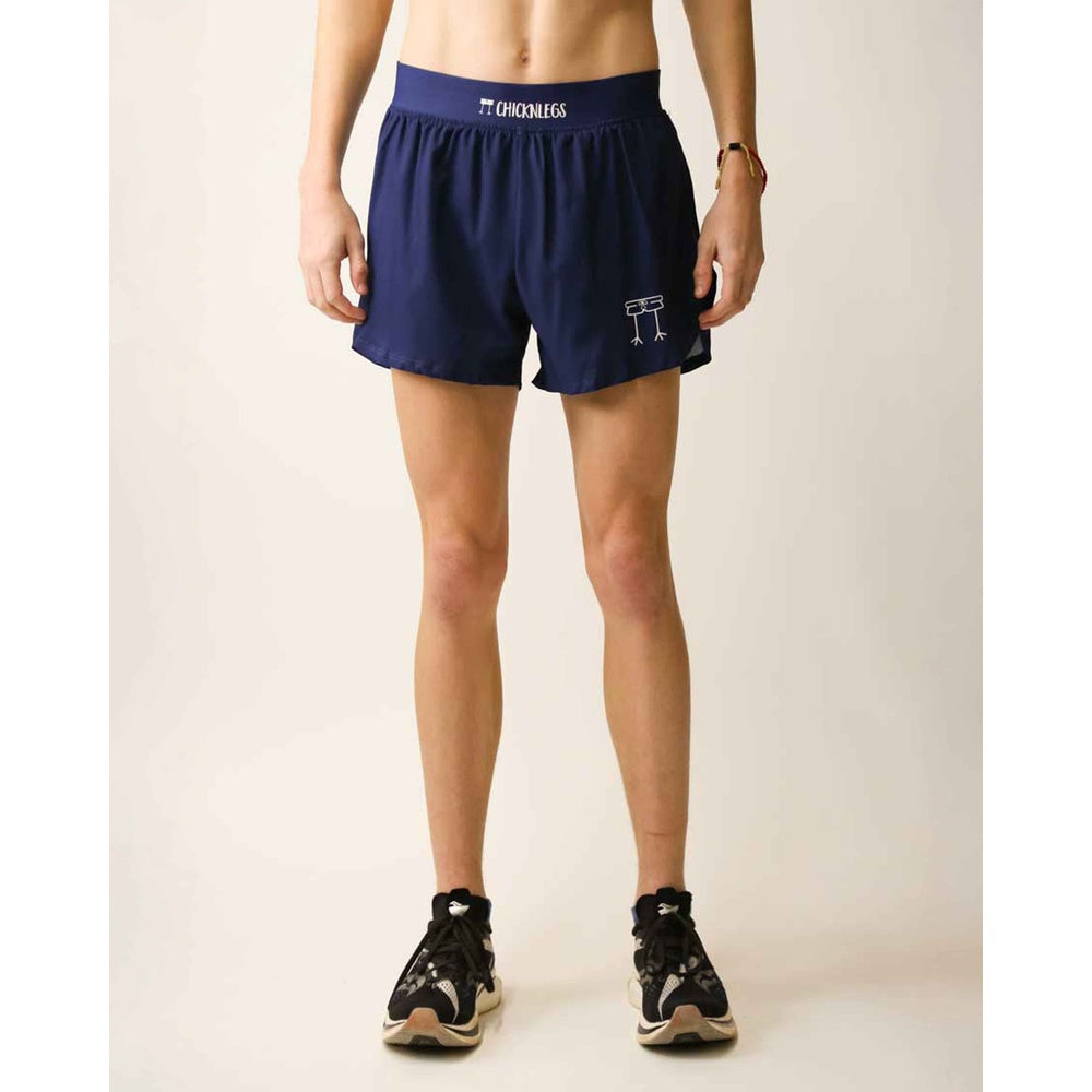 ChicknLegs 4-inch half split running shorts in navy blue worn by male model