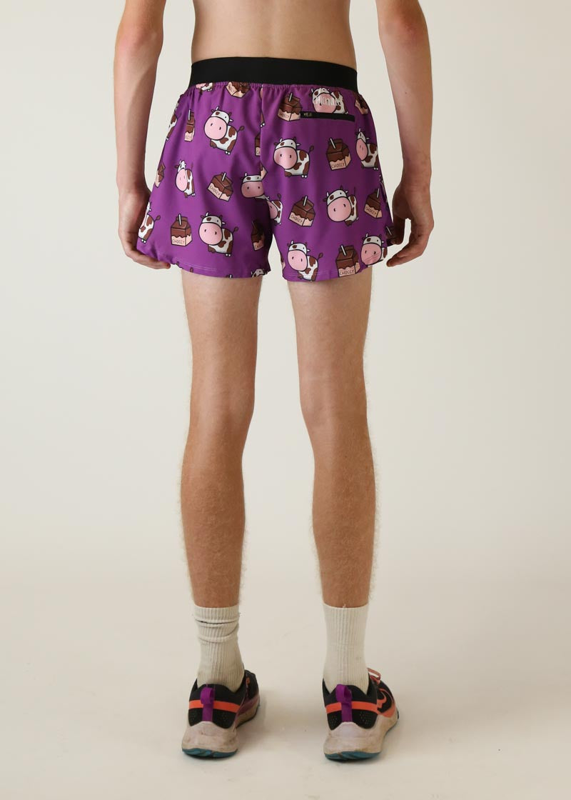 Purple running shorts with cute cow and chocolate bar pattern, modeled from behind