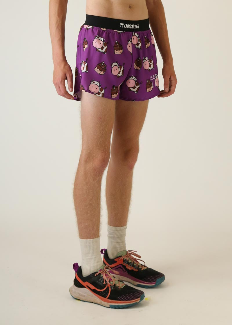 Purple ChicknLegs men's running shorts with cute cow print pattern and black waistband