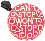 Pink Electra bicycle bell with white 'Can't Stop Won't Stop' text pattern