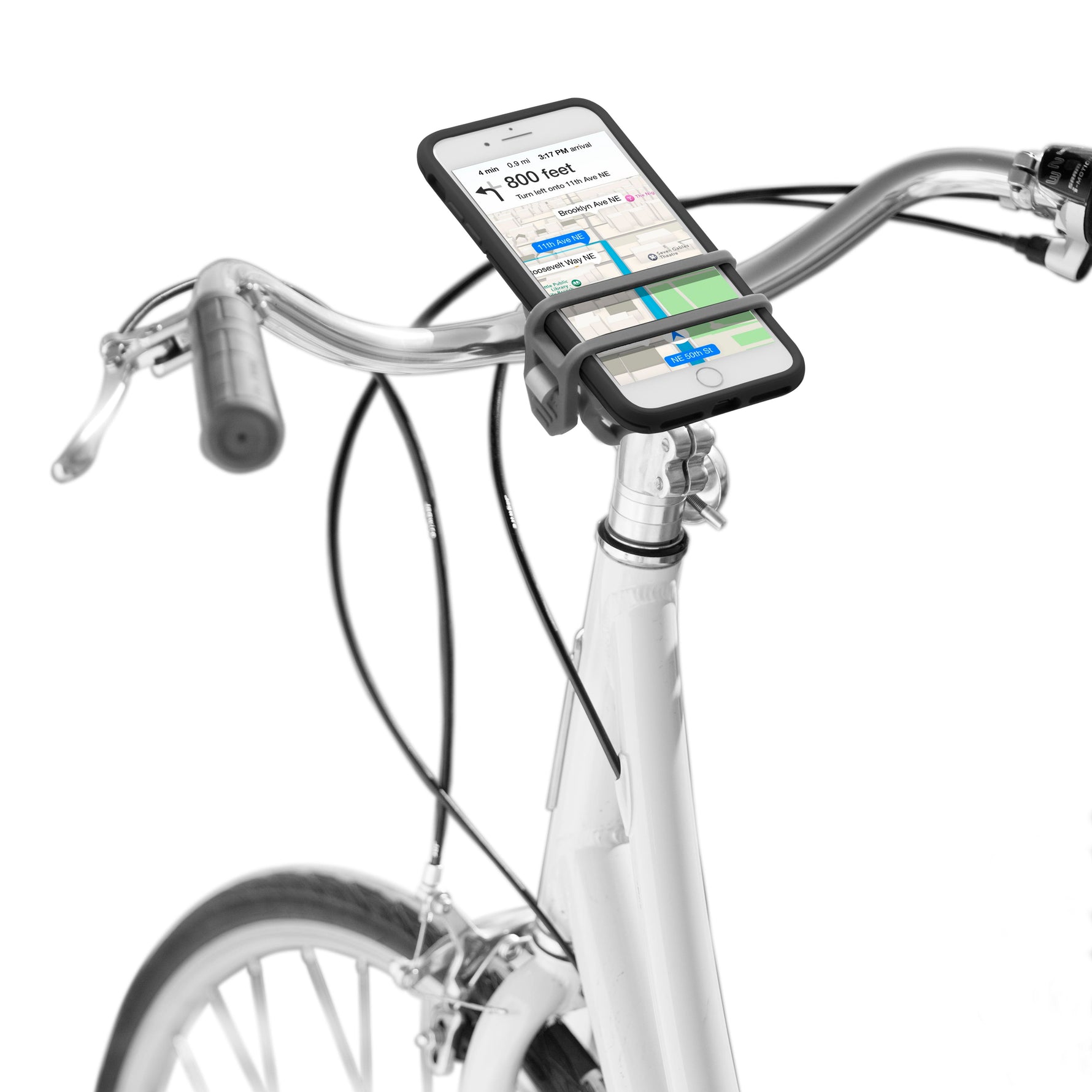 Nite Ize HandleBand clear smartphone mount attached to white bicycle handlebars with phone displaying map
