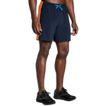 Brooks Moment 7-inch men's running shorts in navy with orange side stripe