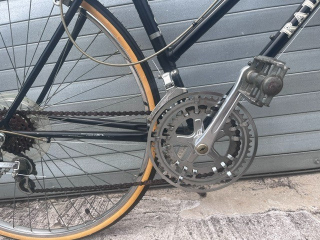 Drop bars with dual safety brake levers on vintage Raleigh Capri road bike