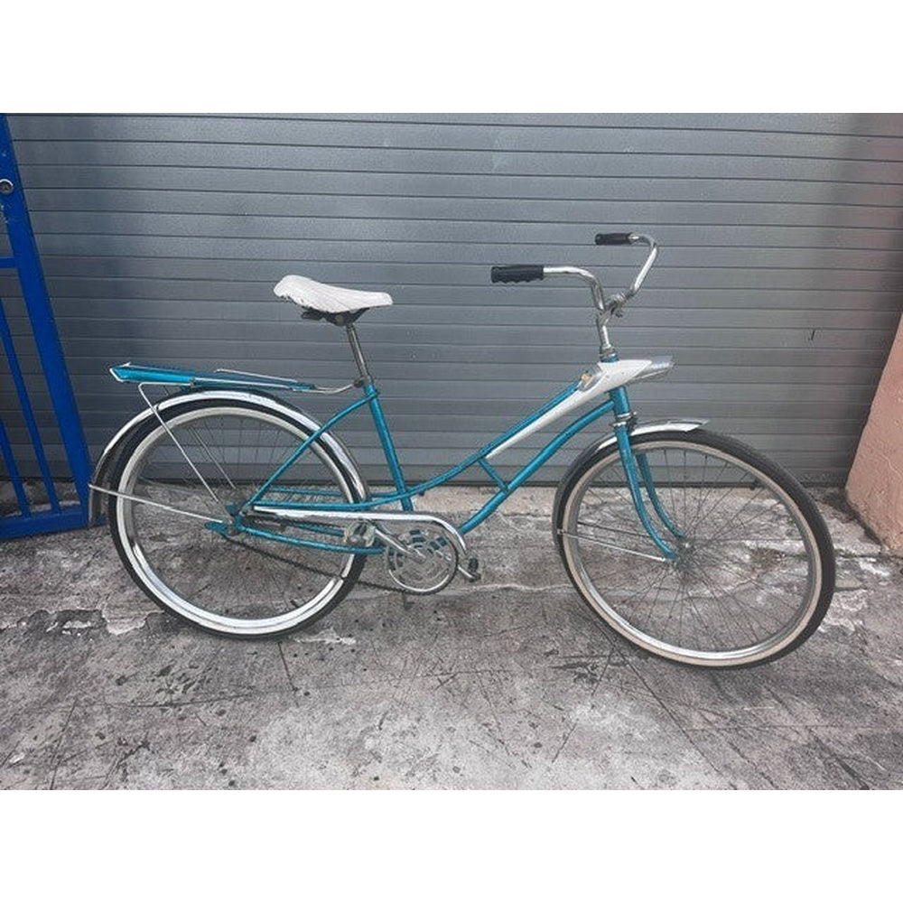 Vintage 1960s Sears Spaceliner 26 inch bike in blue, full side view