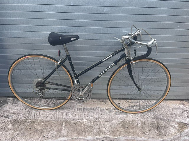 1980s Raleigh Capri 410 road bike in gloss black, full side view