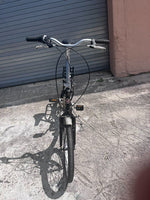 7-speed Shimano drivetrain and V-brake on Schwinn Loop 20 inch folding bike