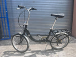Schwinn Loop folding bike folded down, showing hinge and handlepost