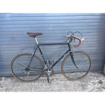 Vintage 1985 Trek 400 road bike in black with tan saddle, full side view