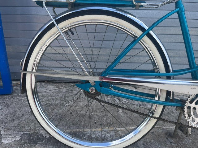 White sprung saddle and rear rack on 1960 J.C. Higgins Flightliner