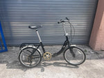 Schwinn Loop 20 inch folding bike in black, full side view unfolded