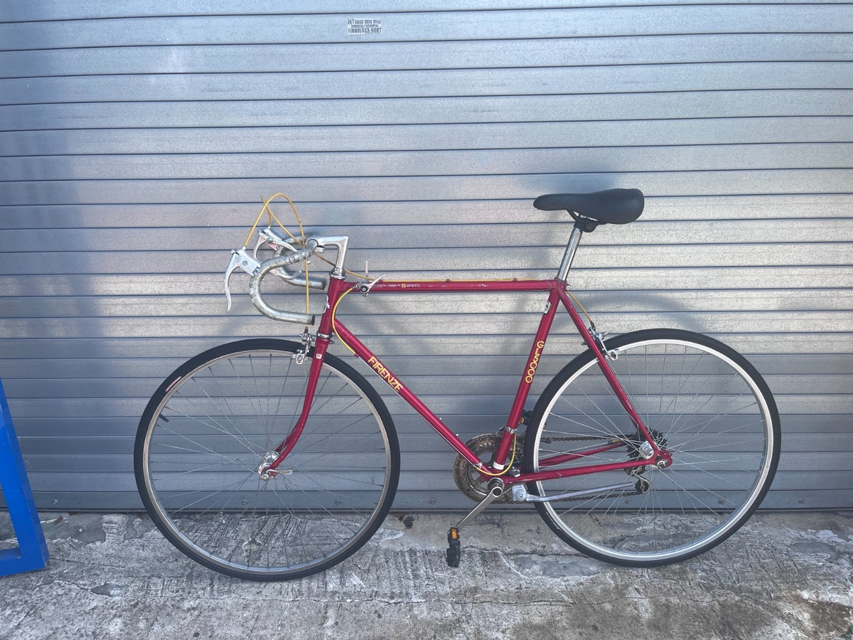 Firenze GL5000 vintage steel road bike side profile with drop handlebars and new black bar tape