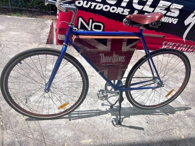 Fold-out Union Jack cabinet open on Three Olives Vodka bar bike