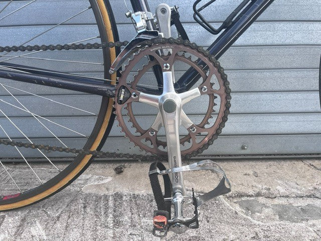 Down tube shifters and black steel frame detail on 1985 Trek 400