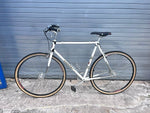 Peugeot checkerboard decals on white steel frame of vintage UO-8 single speed