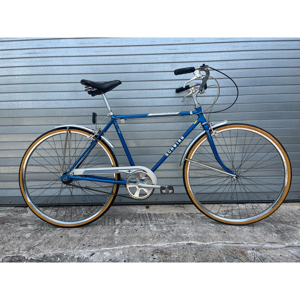 Vintage 1985 Schwinn Collegiate 3-speed cruiser in blue, full side view
