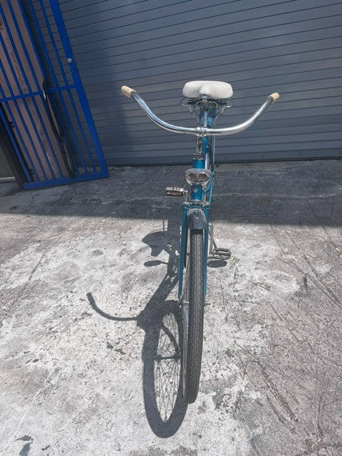 1960 J.C. Higgins Flightliner teal paint and coaster brake rear wheel detail