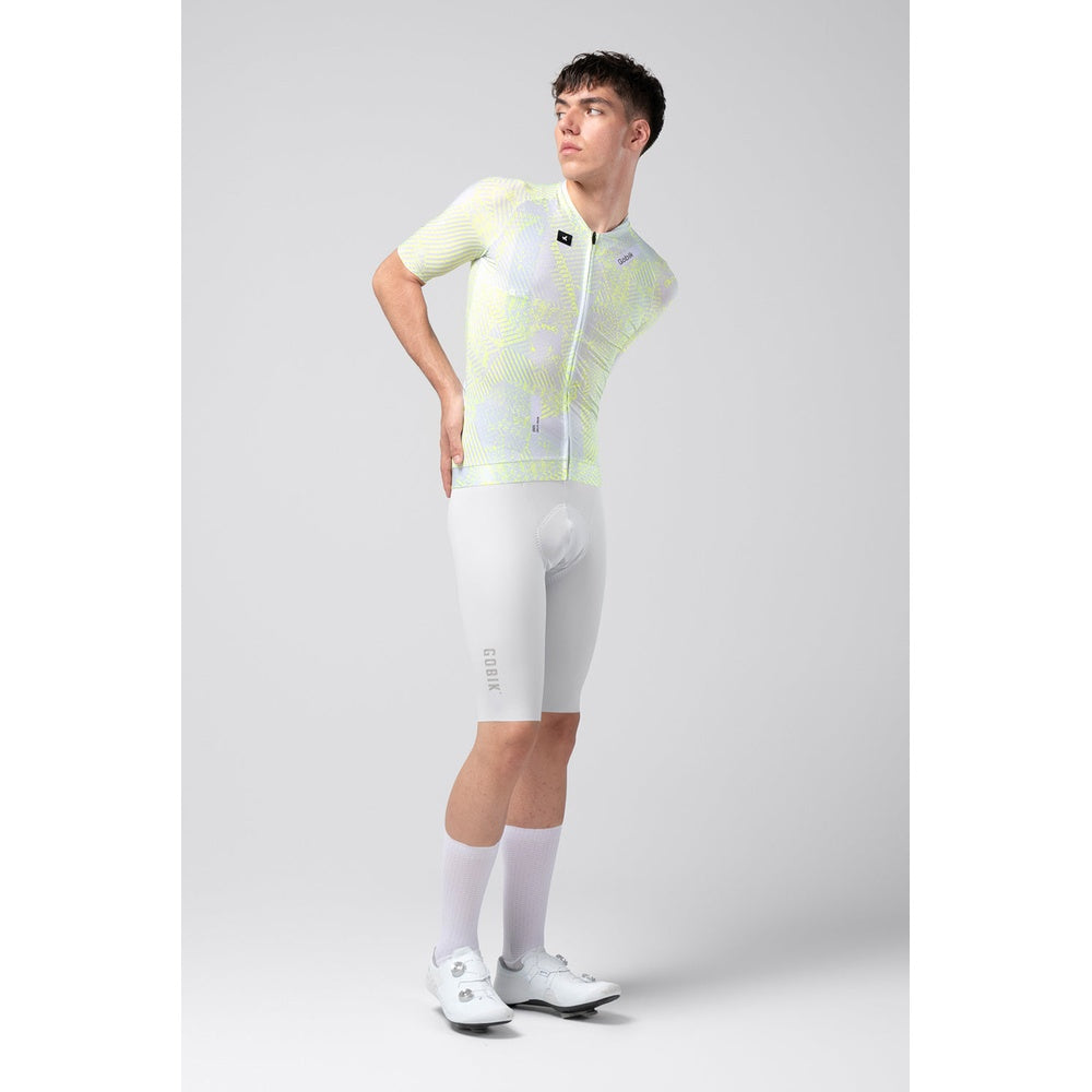Male cyclist wearing Gobik CX Pro 4.0 jersey in white and neon yellow Blast colorway
