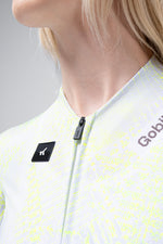 Close-up of Gobik CX Pro cycling jersey in white with yellow amazonian pattern