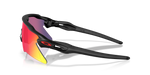 Oakley Radar EV Heater sunglasses side view with reflection showing matte black frame and Prizm Road lens