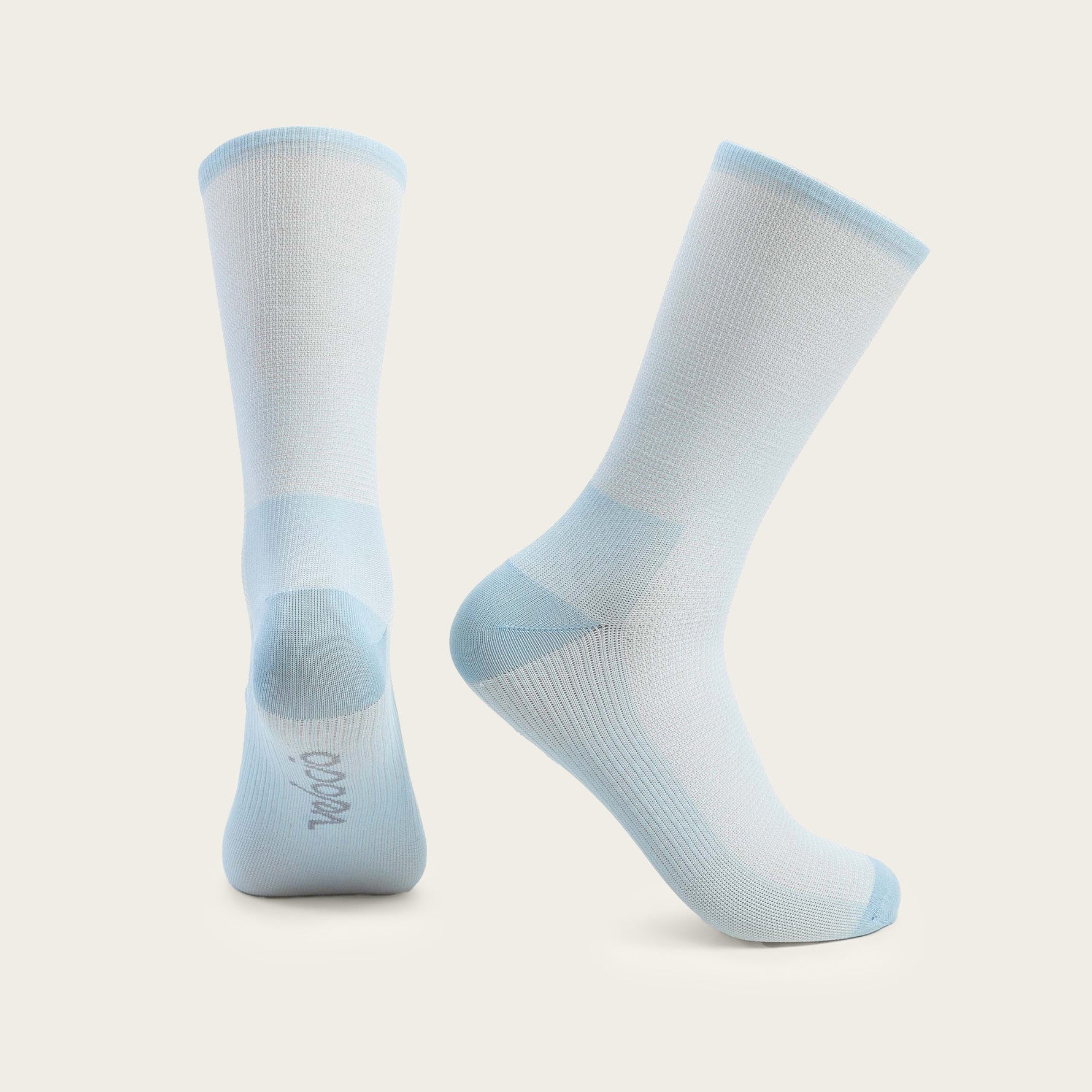 Velocio ultralight cycling socks in light blue and white gradient pattern