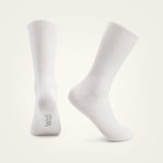 Two white Velocio ultralight crew socks on clean studio background