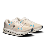 On Cloudsurfer 2 women's running shoes in pearl ivory colorway with blue lace loops